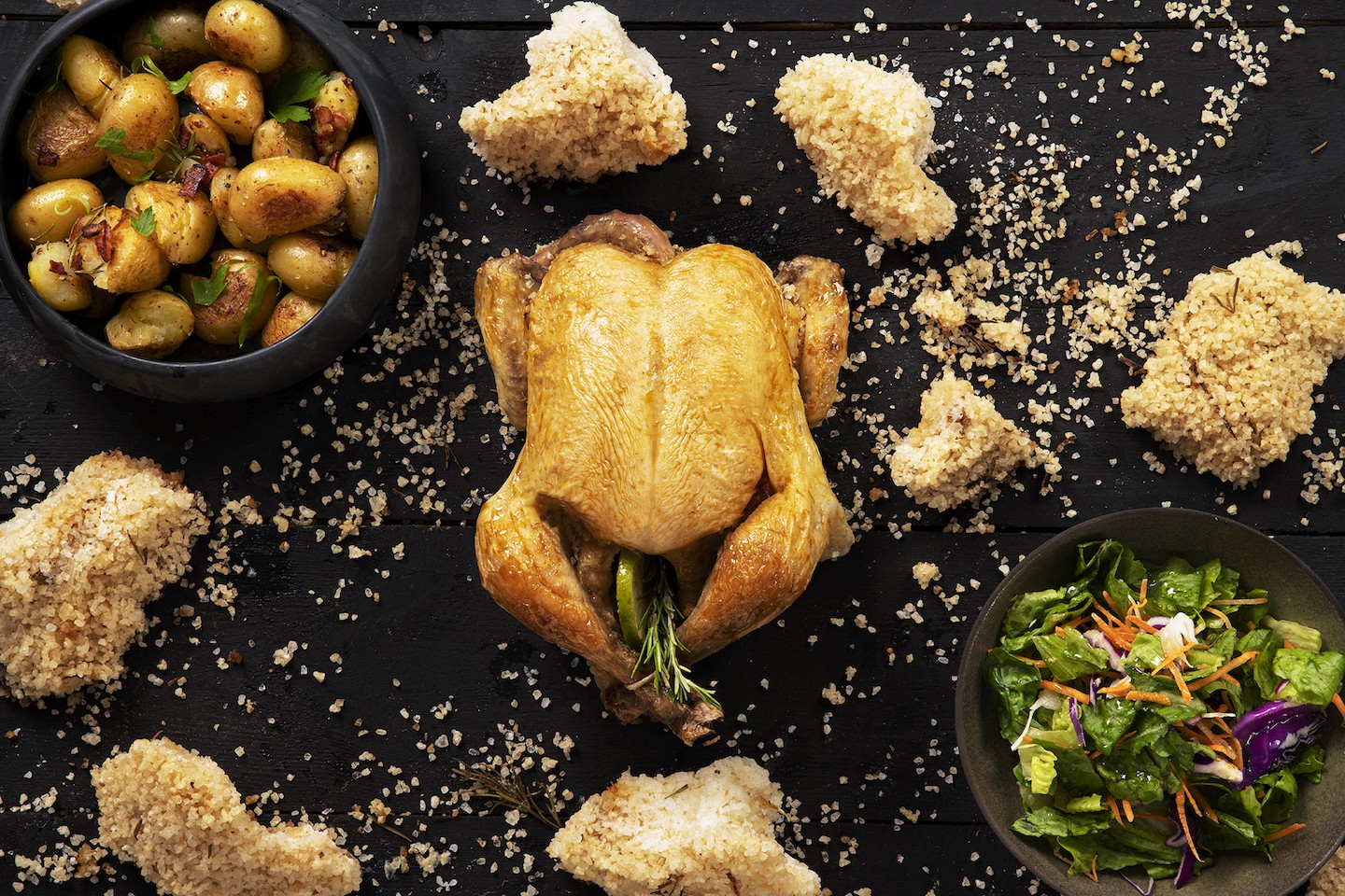 Chicken in salt crust, along with cardamom, rosemary and lemon