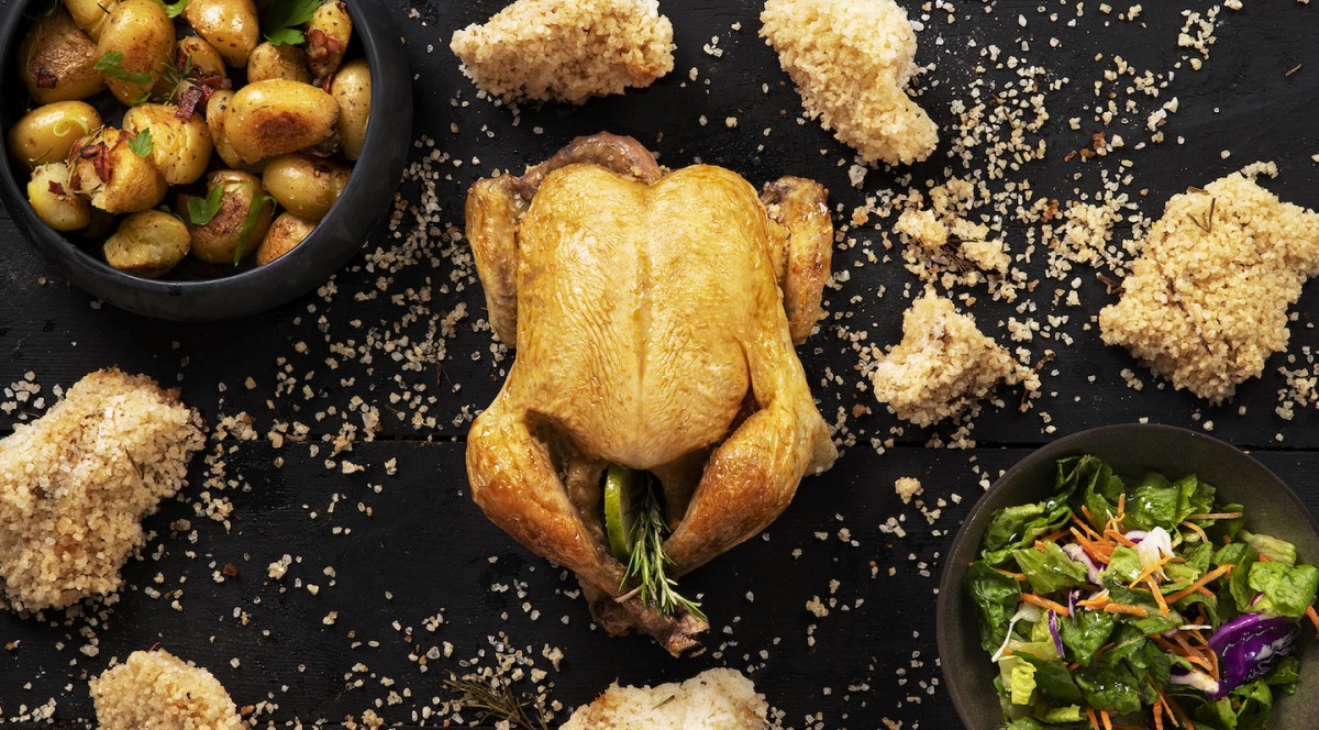 Chicken in salt crust, along with cardamom, rosemary and lemon